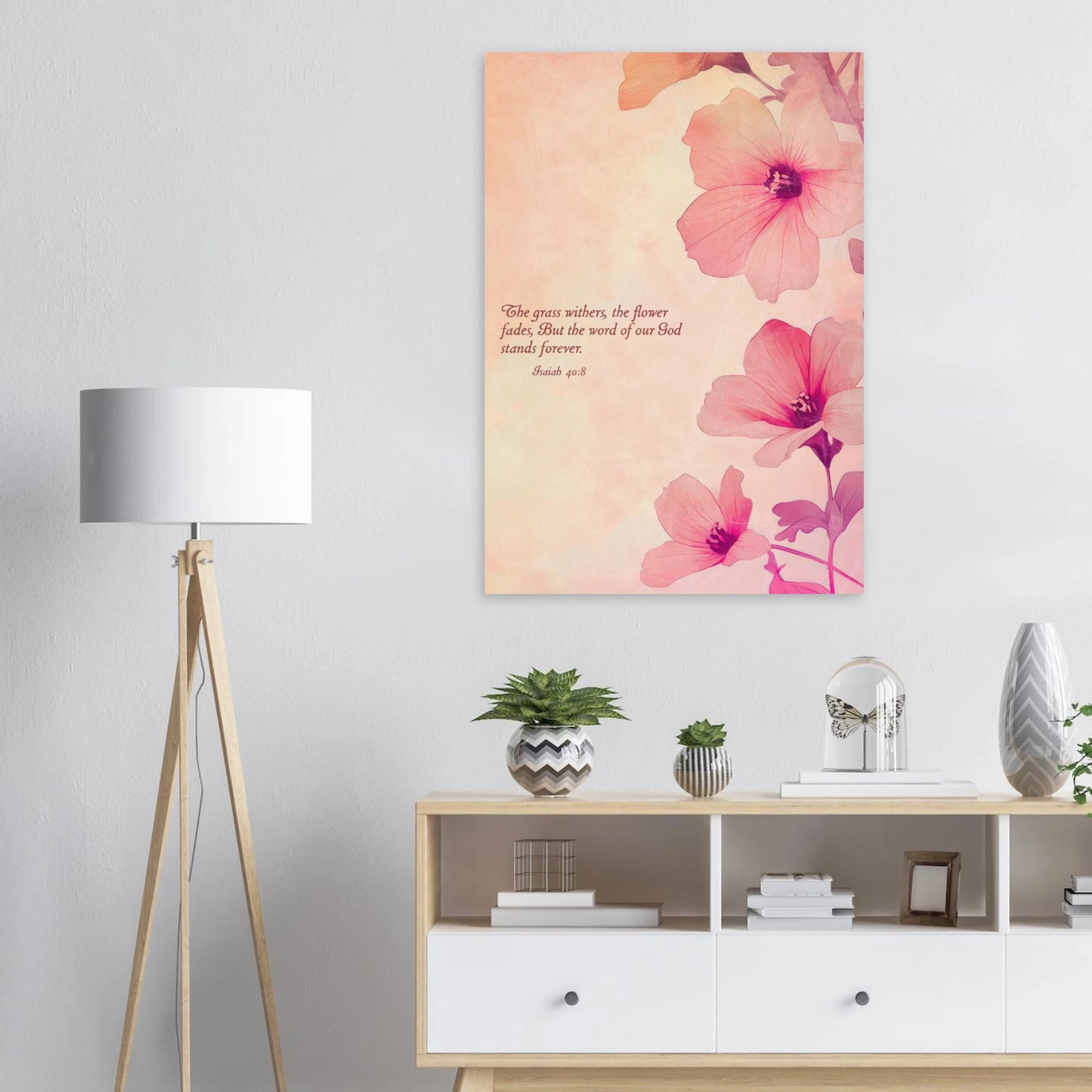 Floral painting on a wall above a wooden cabinet with decorative items.