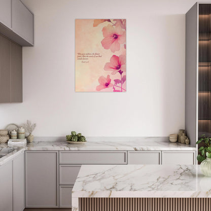 Modern kitchen with marble countertops and a floral painting on the wall.