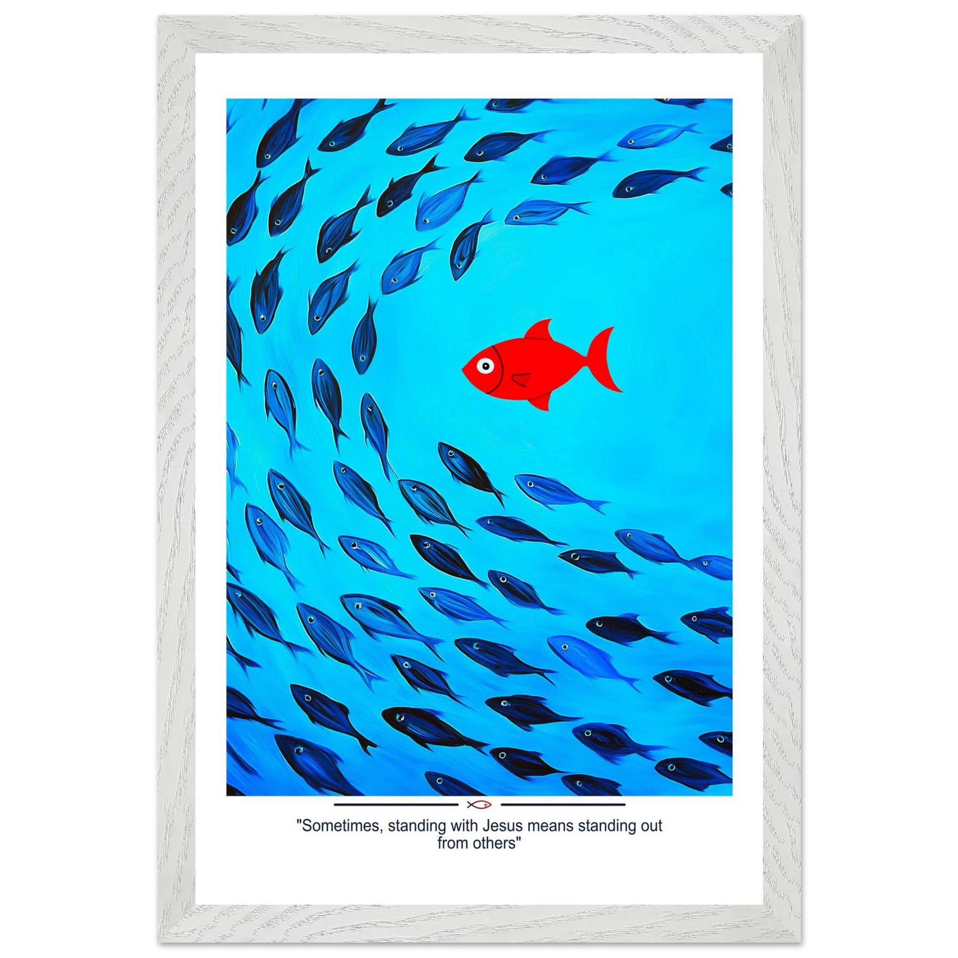 Framed Christian wall art featuring a red fish swimming in water with blue fish, and the text 'Sometimes standing with Jesus means standing out from others' as a quote.