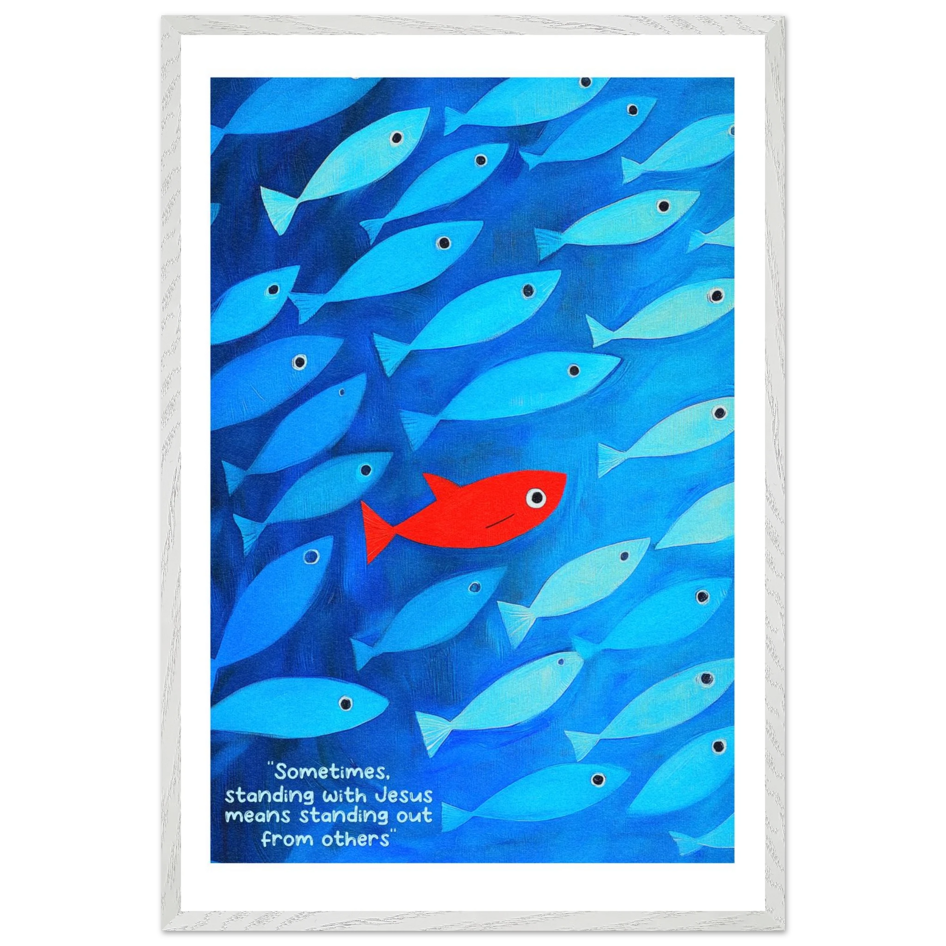 Framed wall art featuring a school of blue fish with a single red fish, and text that reads: 'Sometimes standing with Jesus means standing out from others.'.