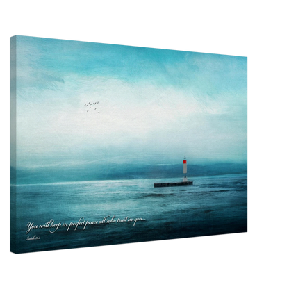 A canvas wall art print featuring a lighthouse with a backdrop of the sea and sky, including a quote about perfect peace.
