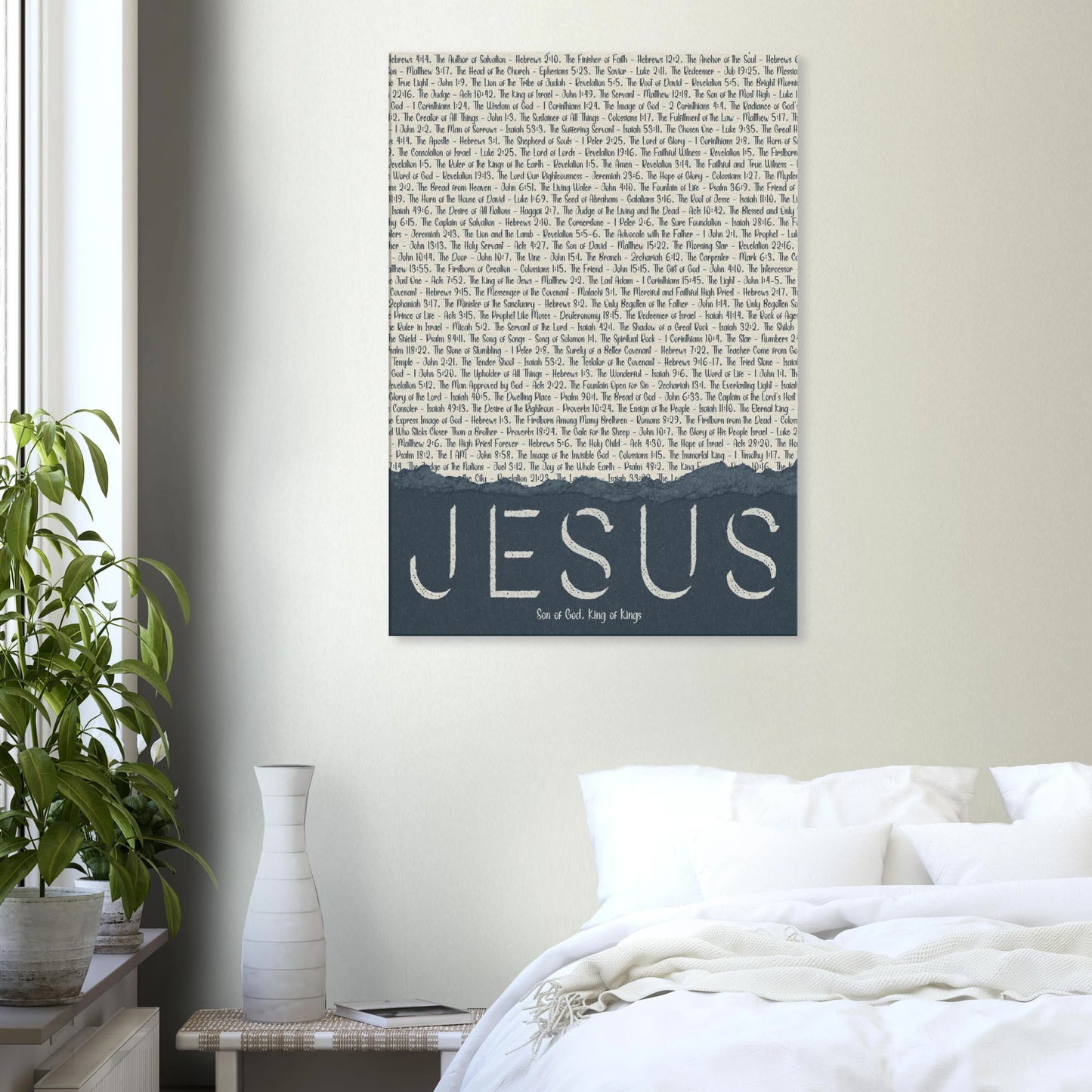 Wall art with 'Jesus' on a bedroom wall