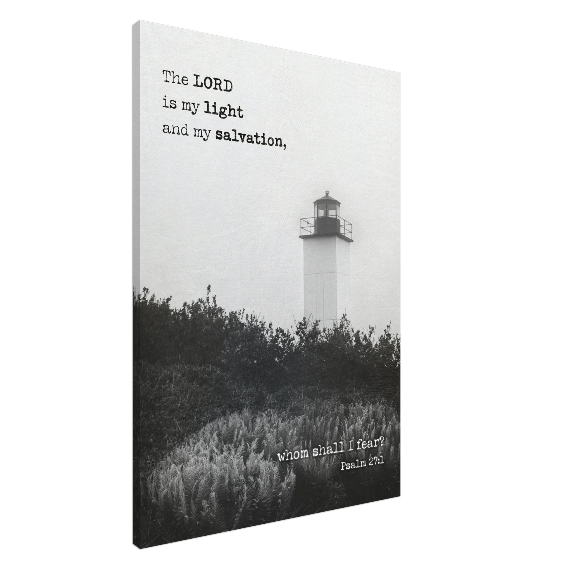 A canvas wall art print featuring a lighthouse with a black and white coastal landscape and the text of Psalm 27:1 which reads 'The Lord is my light and my salvation.'.