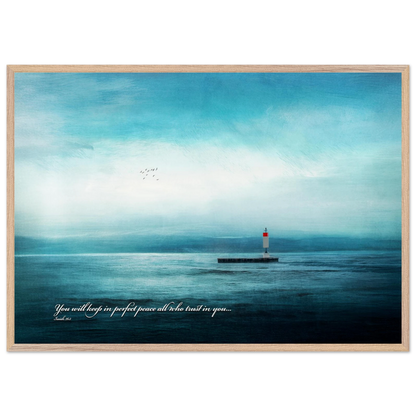 A framed poster featuring a lighthouse in a serene seascape with the text 'You will keep in perfect peace all who trust in you.' from Isaiah 26:3.