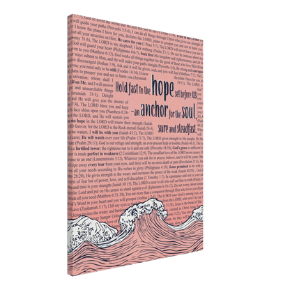 A vertical canvas wall art with a pink background featuring text from Hebrews 6:19 and an illustration of ocean waves with an anchor.
