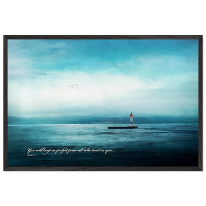 A framed poster featuring a lighthouse in a serene seascape with the text 'You will keep in perfect peace all who trust in you.' from Isaiah 26:3.