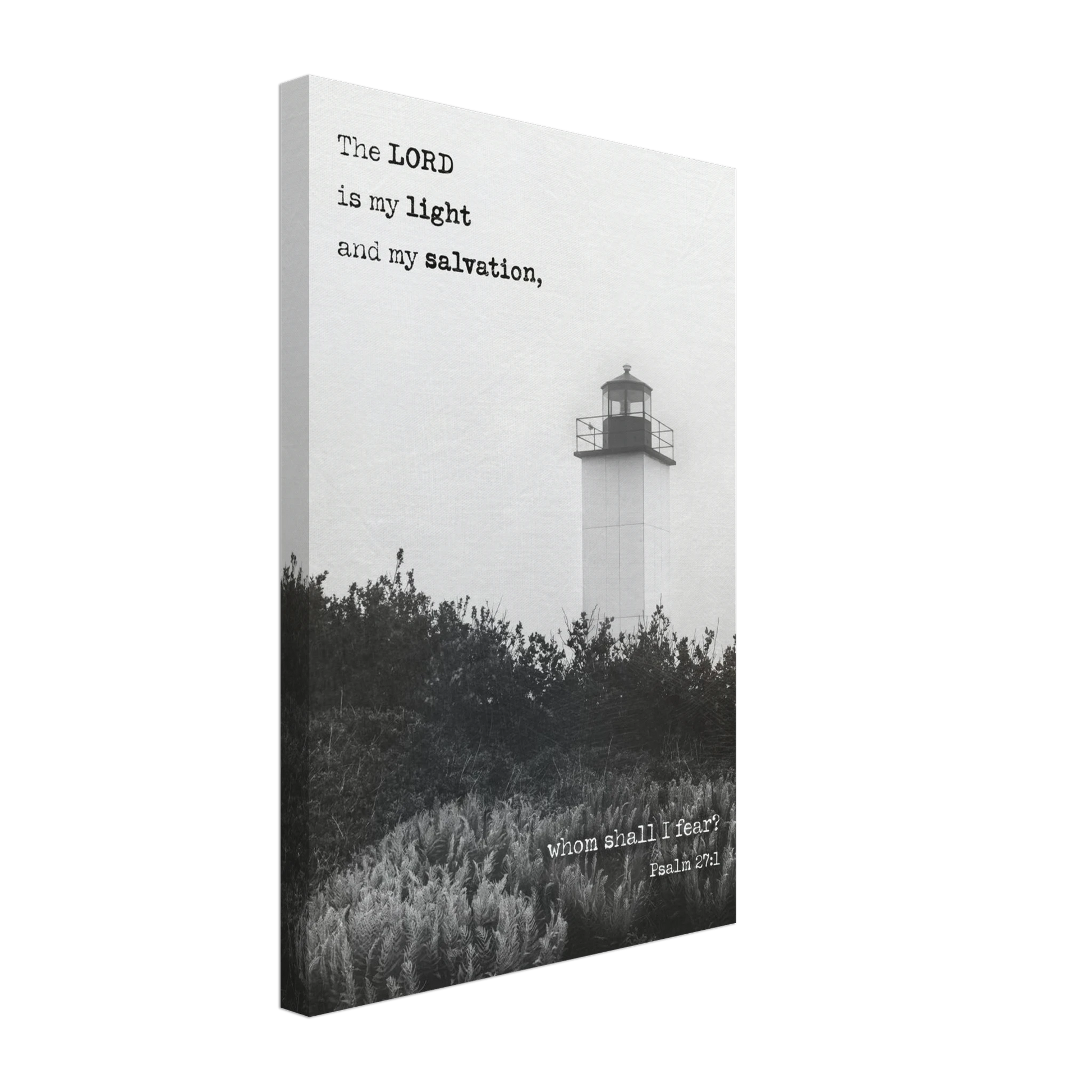 A canvas wall art print featuring a lighthouse with a black and white coastal landscape and the text of Psalm 27:1 which reads 'The Lord is my light and my salvation.'.