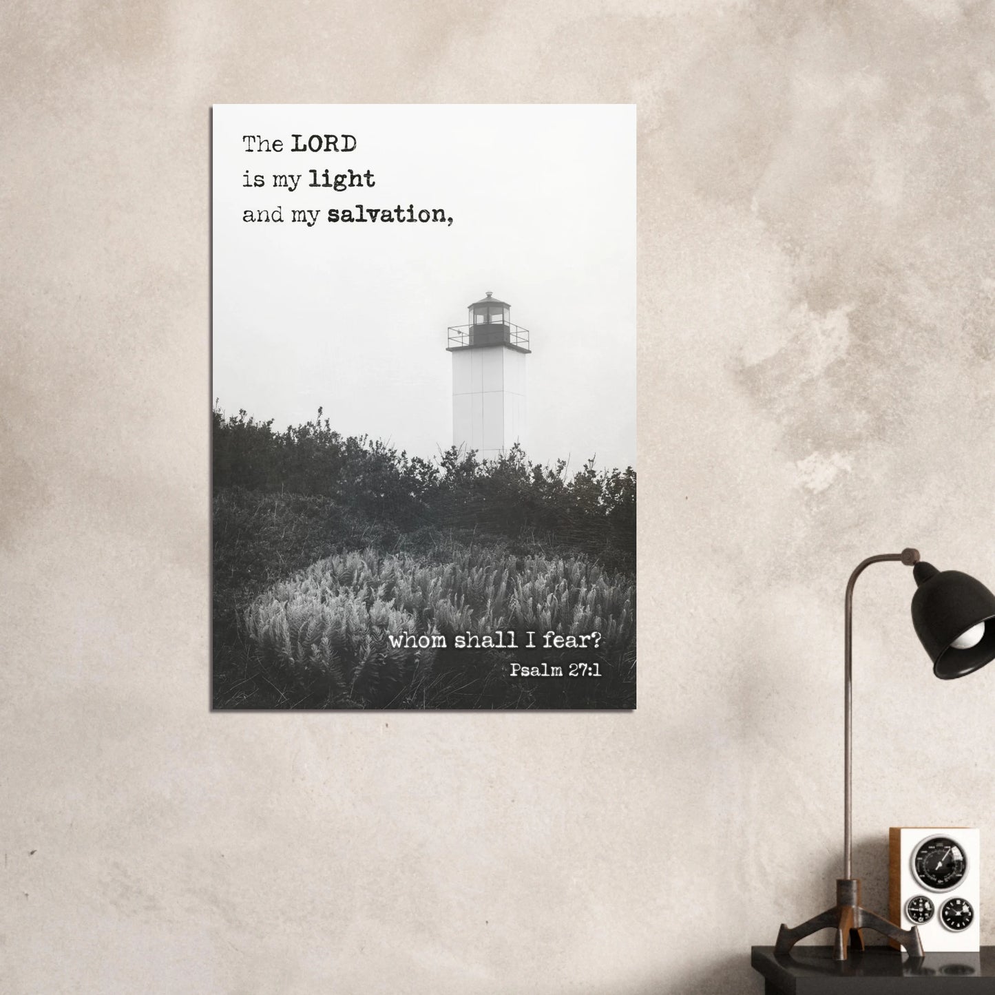Poster with lighthouse and Bible verse on a wall in a room.