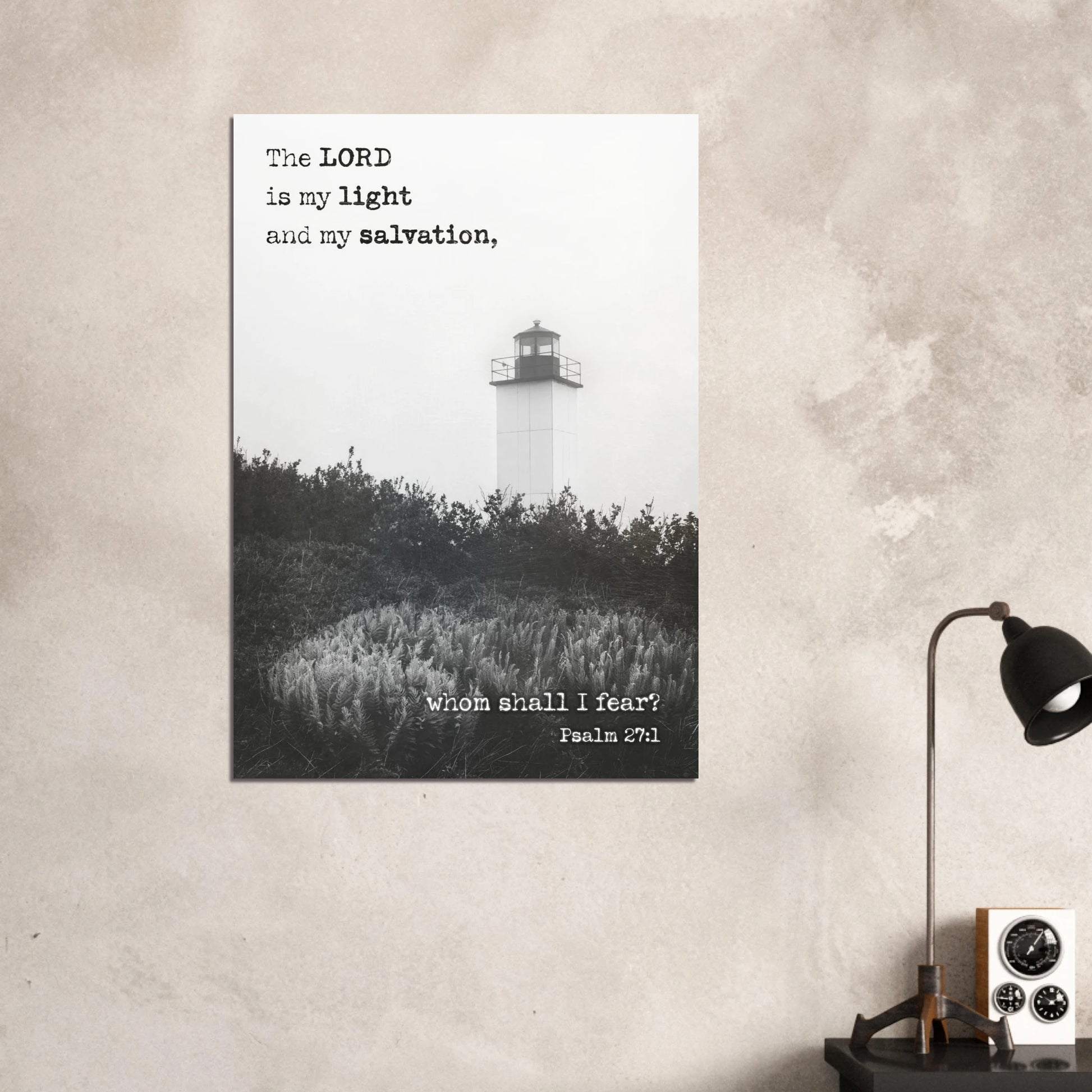 Poster with lighthouse and Bible verse on a wall in a room.