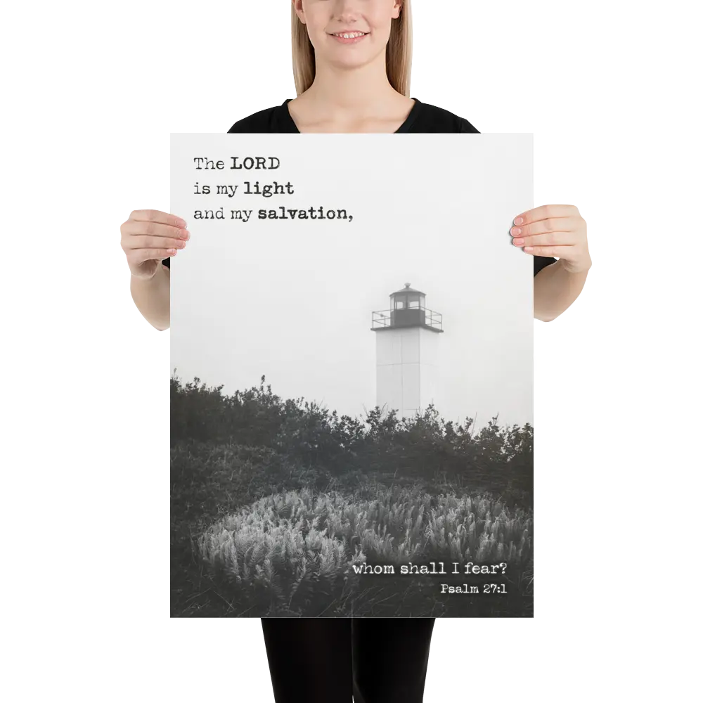 Person holding a poster with a lighthouse and religious text