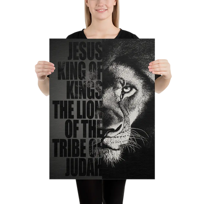 Person holding a poster with a lion's face and text on a black background