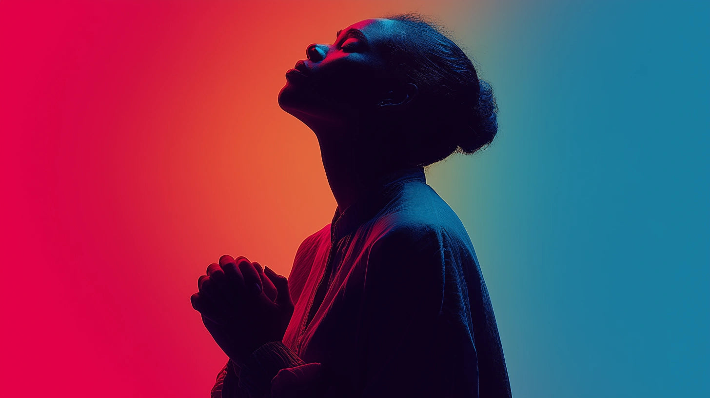 Silhouette of a person with clasped hands against a gradient background
