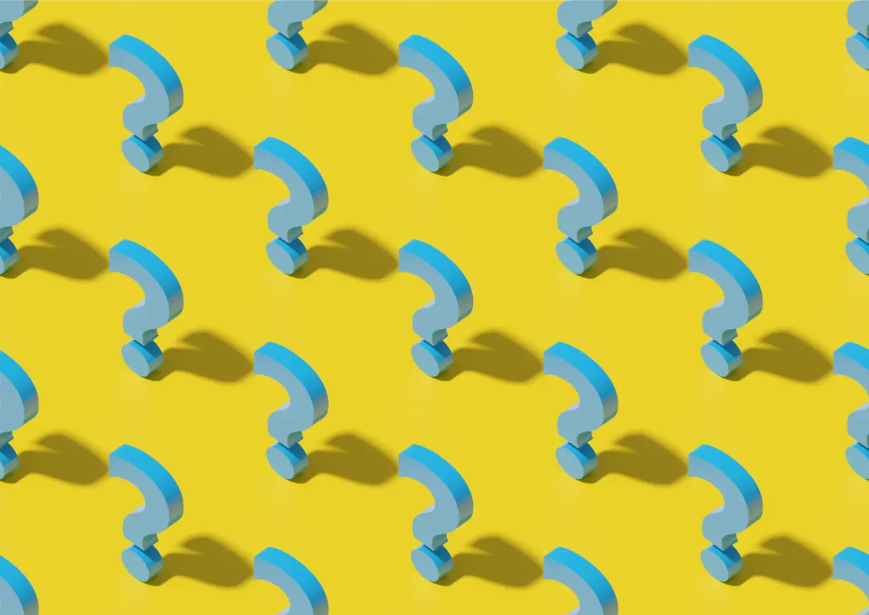 Pattern of blue question marks on a yellow background