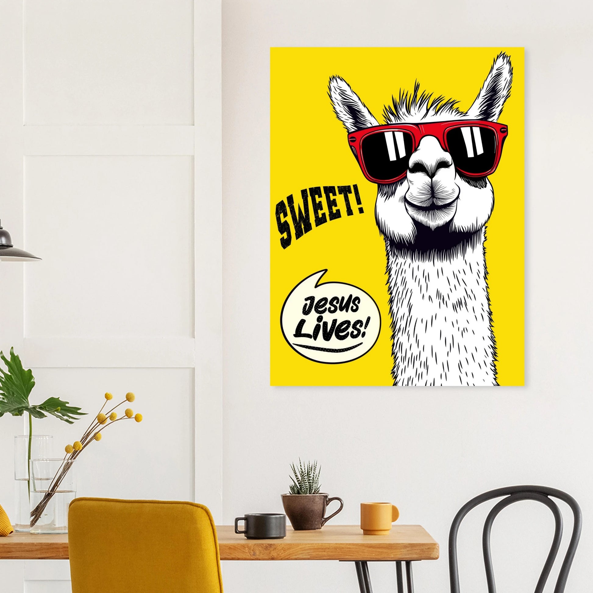 Llama ‘Jesus Lives’ poster displayed on a bright dining room wall.