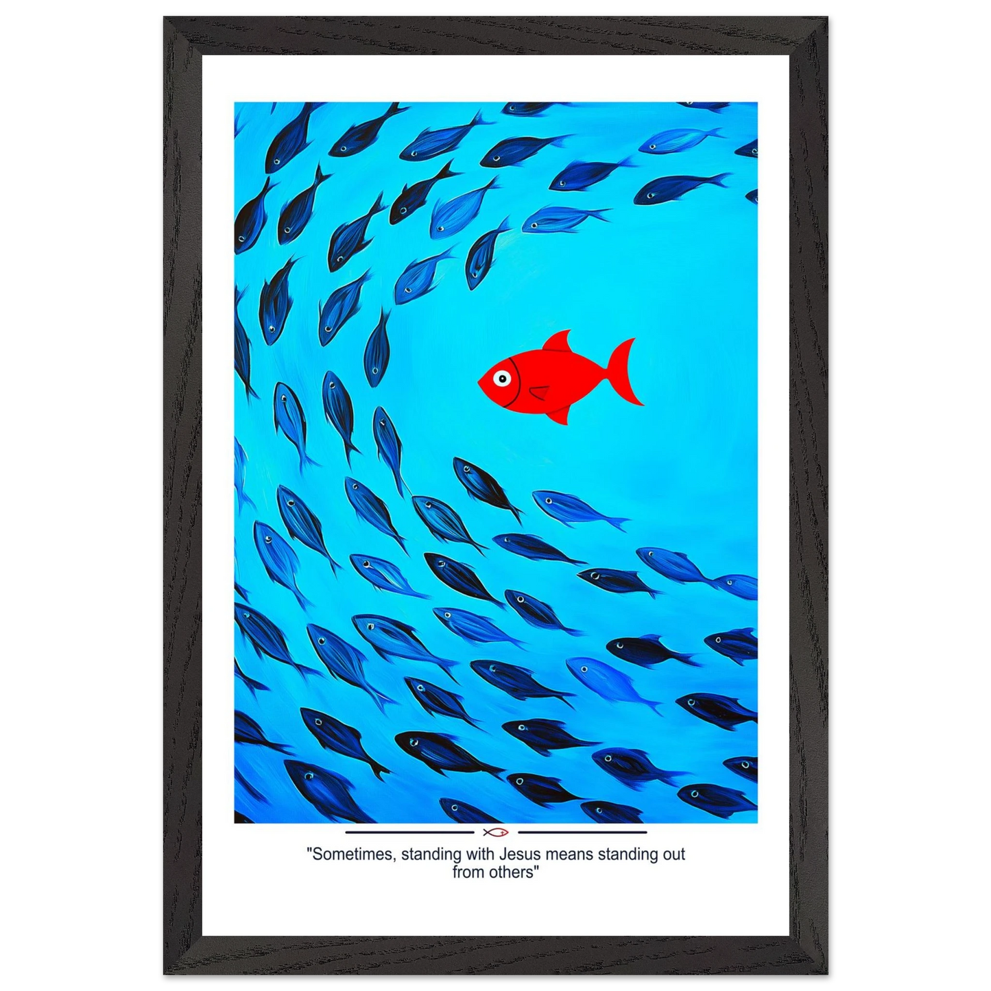 Framed Christian wall art featuring a red fish swimming in water with blue fish, and the text 'Sometimes standing with Jesus means standing out from others' as a quote.