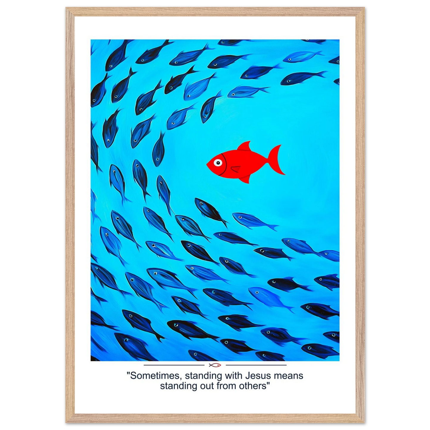 Framed Christian wall art featuring a red fish swimming in water with blue fish, and the text 'Sometimes standing with Jesus means standing out from others' as a quote.