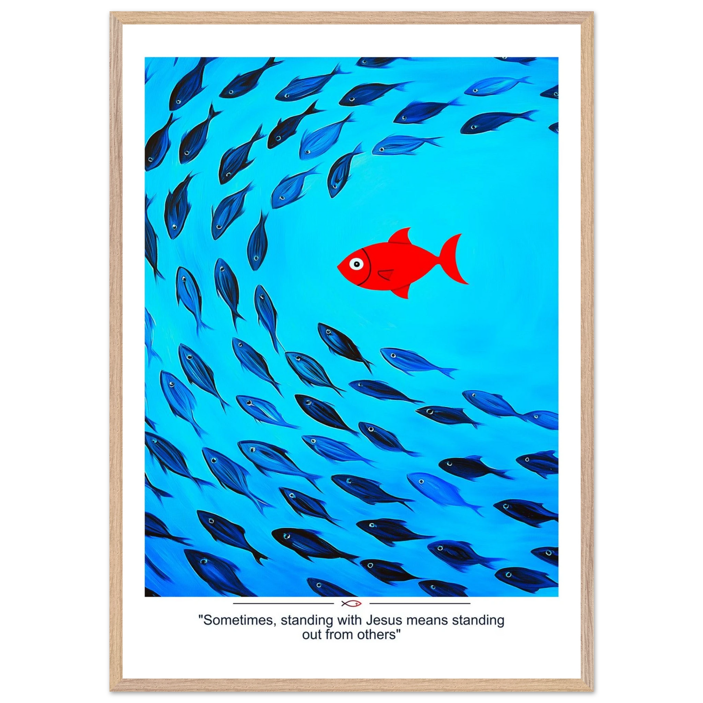 Framed Christian wall art featuring a red fish swimming in water with blue fish, and the text 'Sometimes standing with Jesus means standing out from others' as a quote.