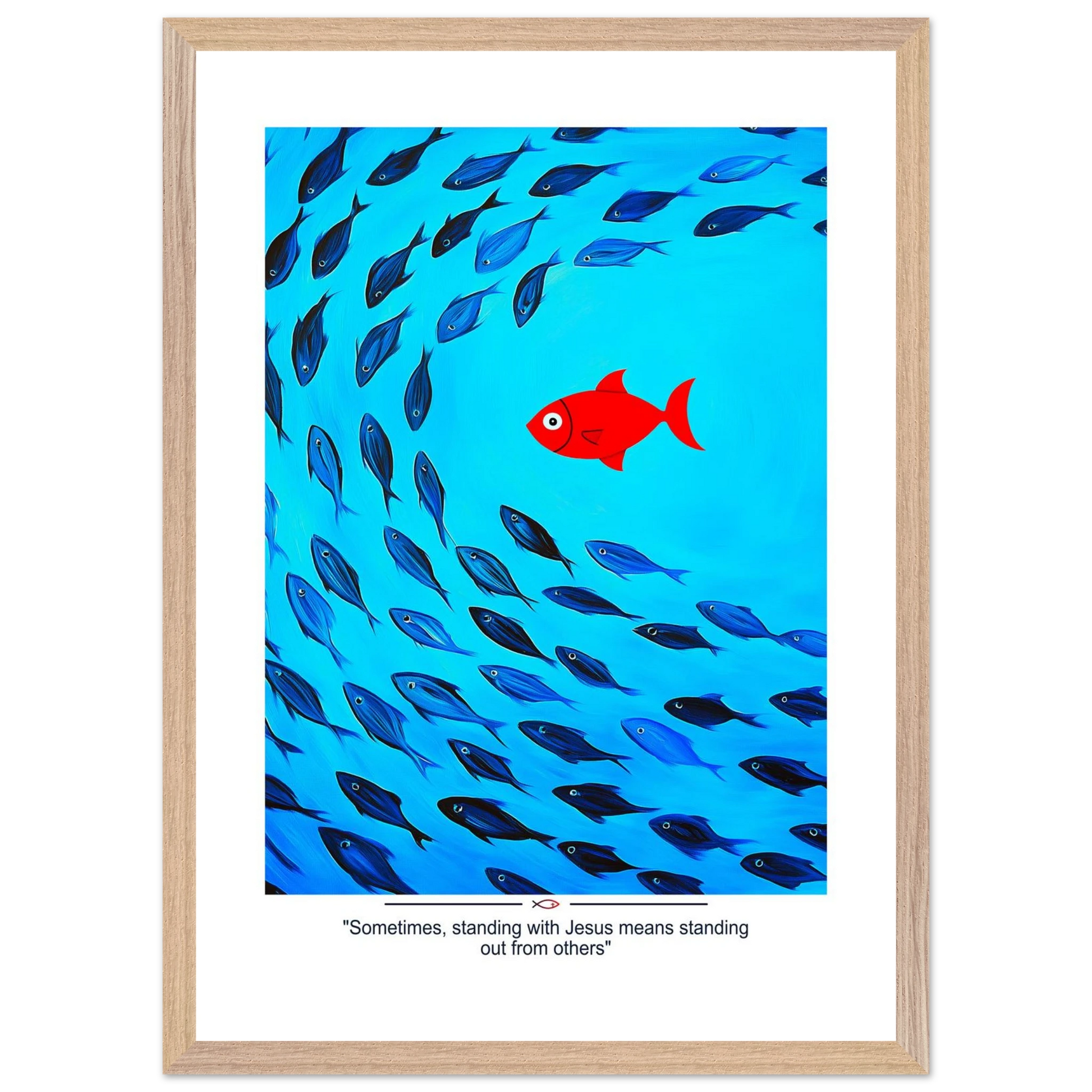 Framed Christian wall art featuring a red fish swimming in water with blue fish, and the text 'Sometimes standing with Jesus means standing out from others' as a quote.